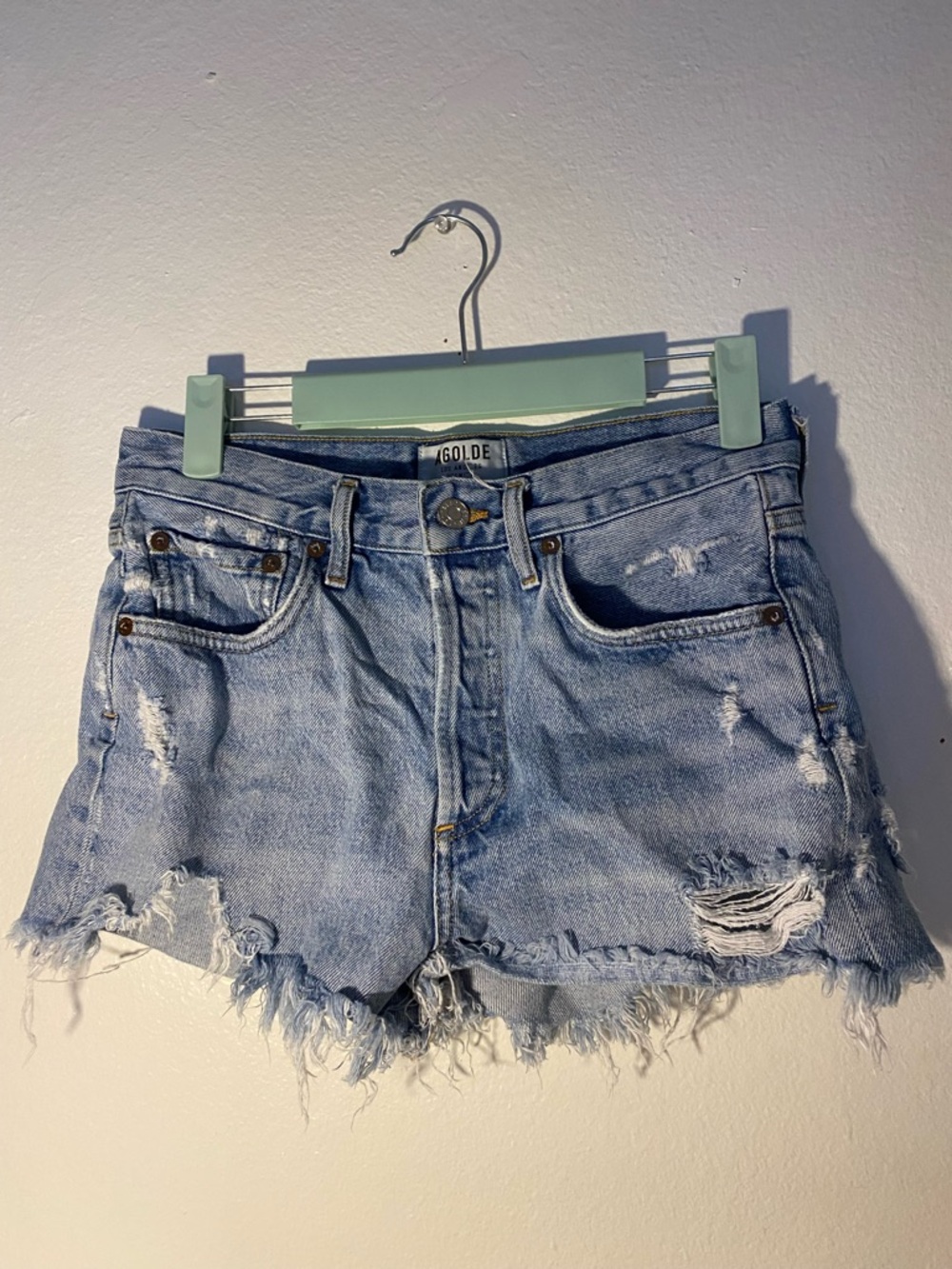 Agolde women’s size 24 blue denim ripped up shorts
